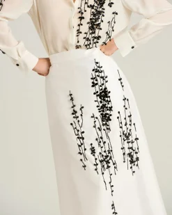 COTTON SILK SATIN TAILORED SKIRT WITH RAISED EMBROIDERY IN OPTICAL WHITE