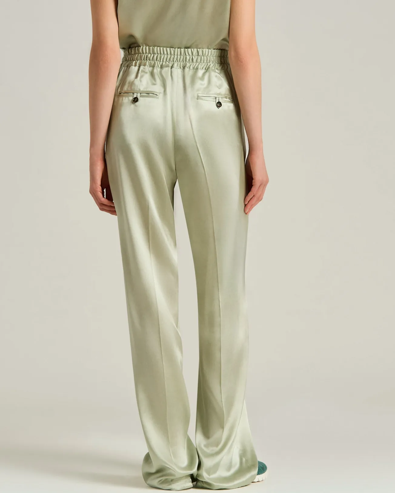 FLUID SATIN TROUSERS IN GREEN SILK