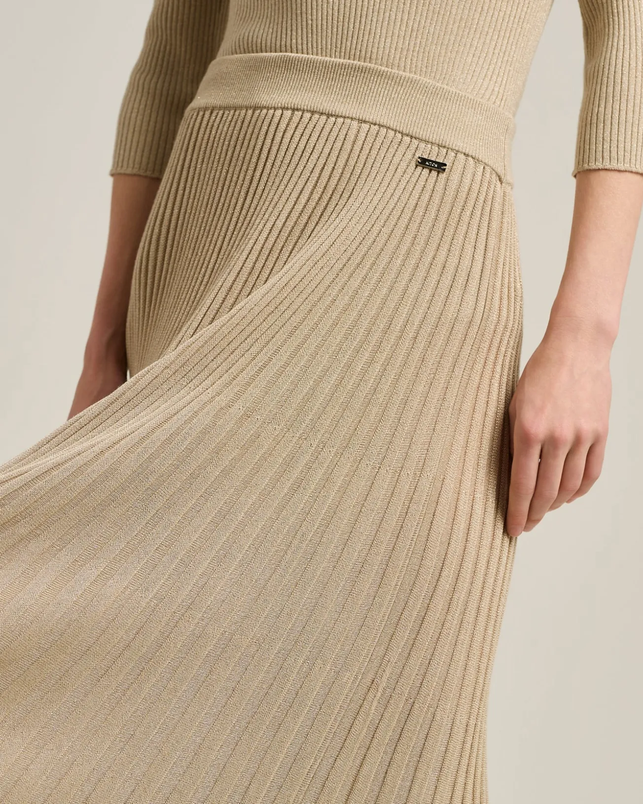 LONG SKIRT IN WOOL LAMÉ BEIGE WITH PLEATS
