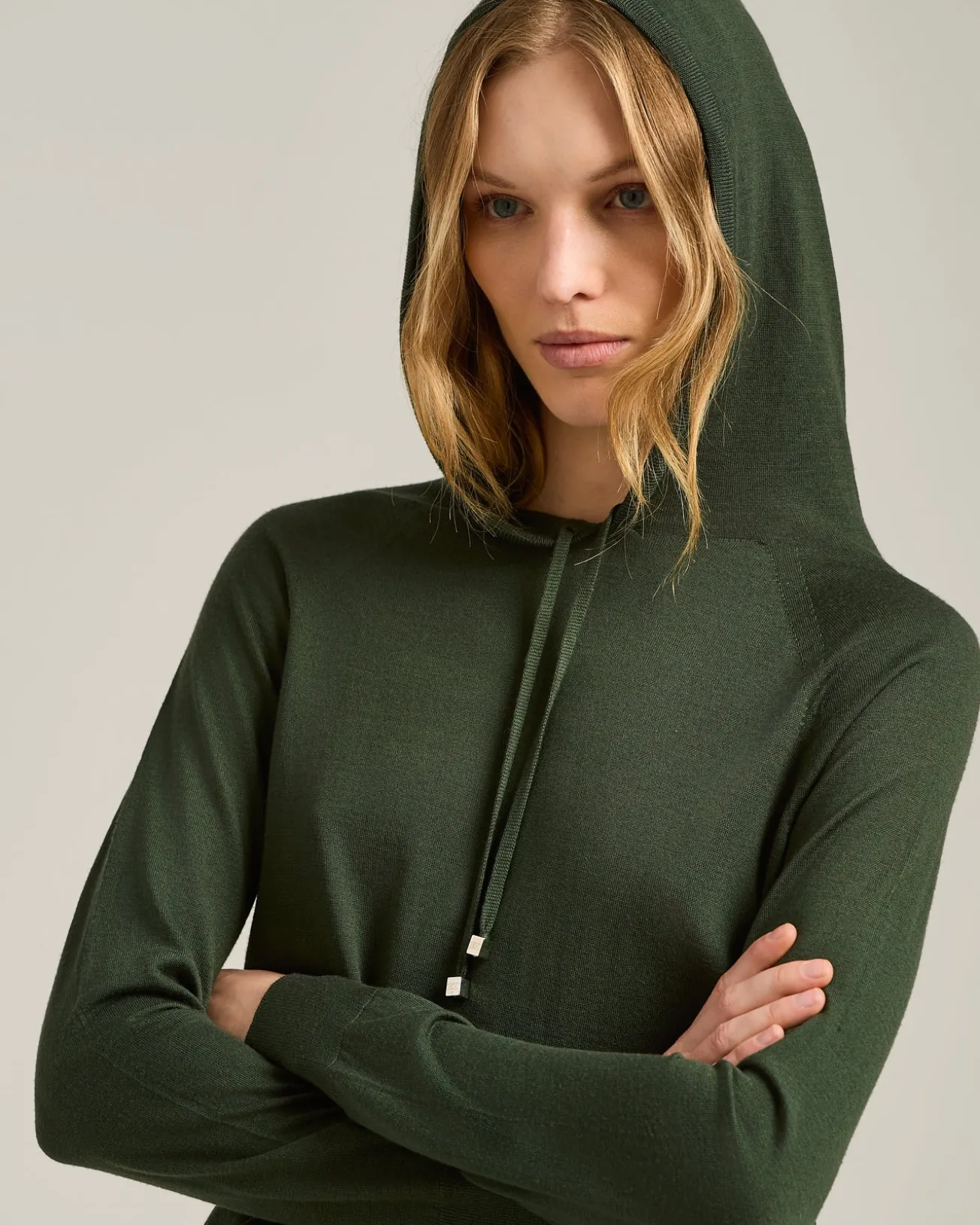 PURE‑WOOL HOODED SWEATSHIRT IN FOREST GREEN