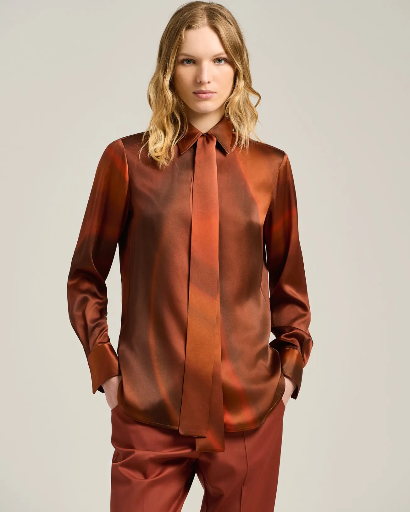 RUST-COLORED PRINTED SILK BLOUSE WITH TIE NECK