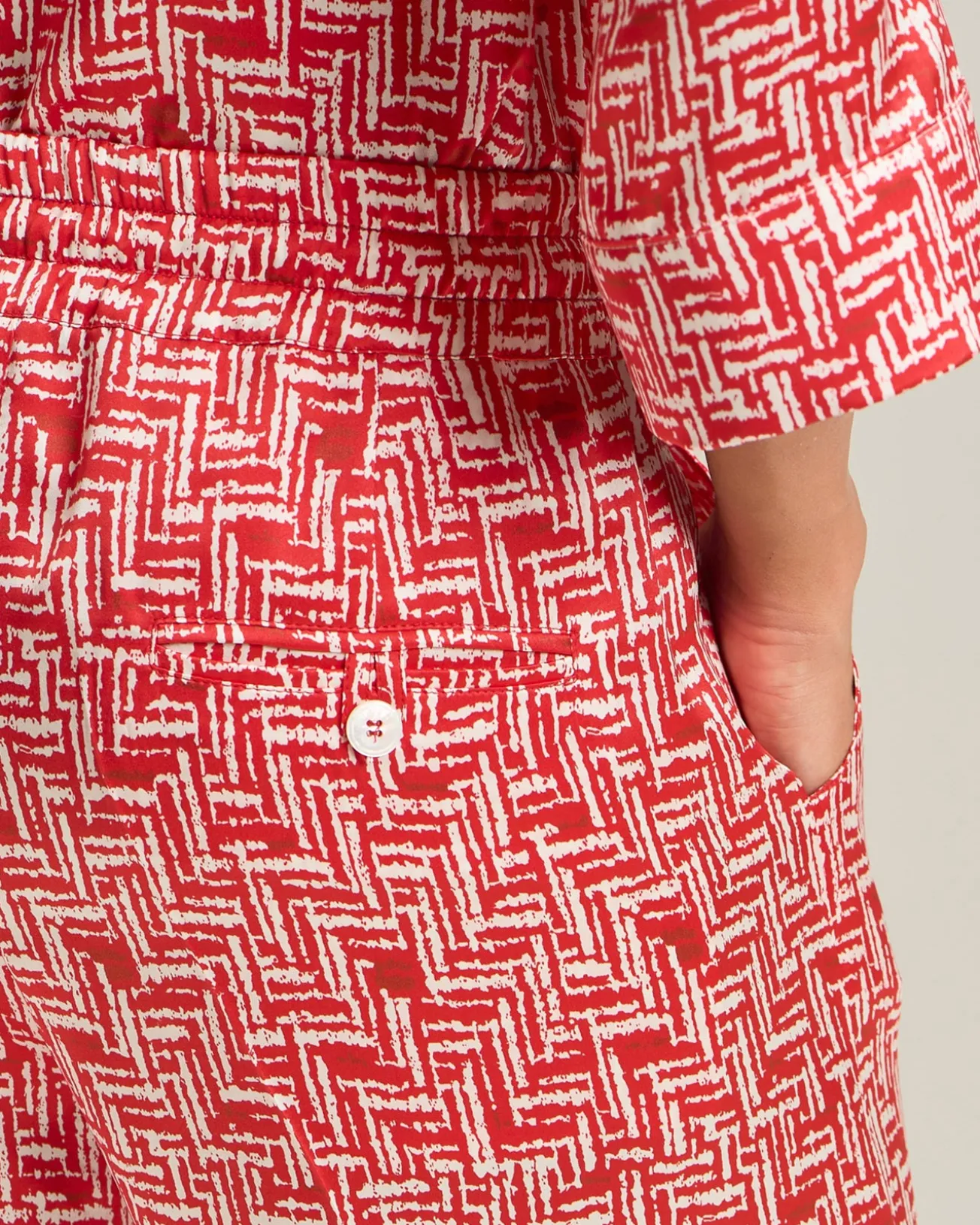 SILK TROUSERS WITH SCARLET STAIRS PATTERN